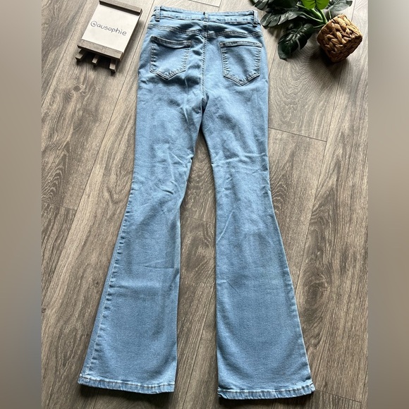 Shein high waisted ripped flared jeans in light wash blue. Size petite M/6 - Picture 8 of 13